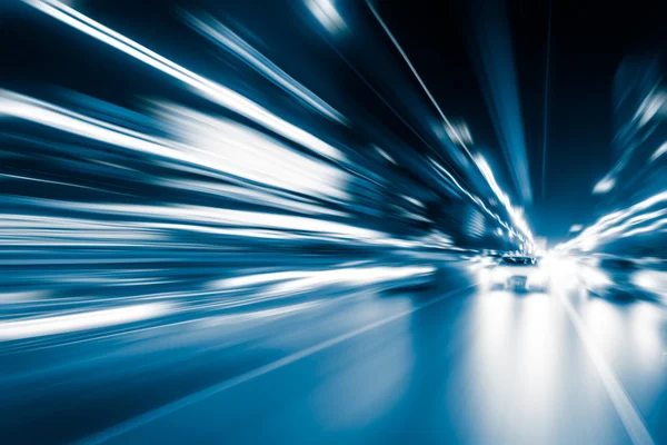 Blue color tunnel car driving motion blur — Stock Photo, Image