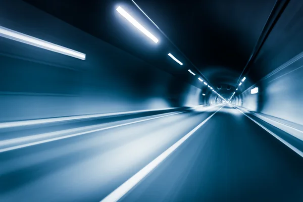 Blue color tunnel car driving motion blur — Stock Photo, Image