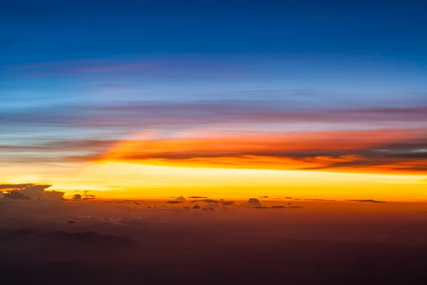 Clouds and sky as seen through window of an aircraft — Stock Photo, Image