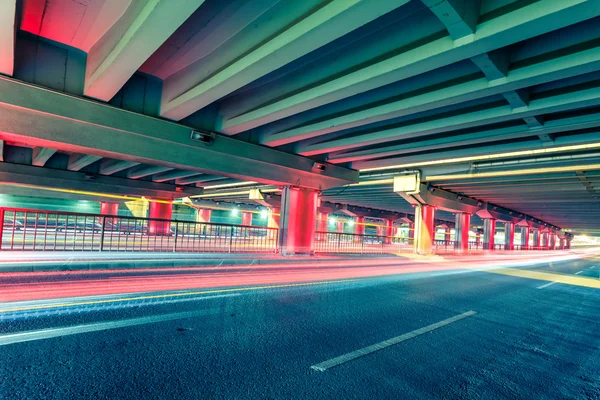 Light traces on traffic junctions at night — Stock Photo, Image