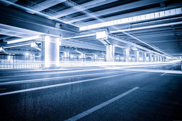 Light traces on traffic junctions at night — Stock Photo, Image