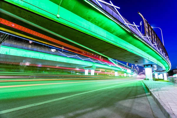 Light traces on traffic junctions at night — Stock Photo, Image