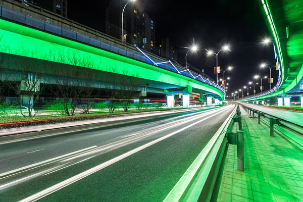 Light traces on traffic junctions at night — Stock Photo, Image