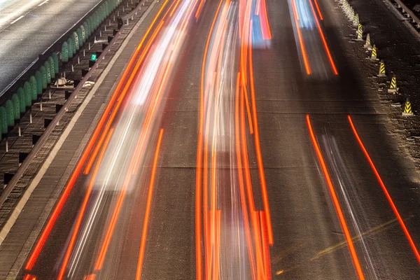 Sfocatura traffico notturno occupato — Foto Stock