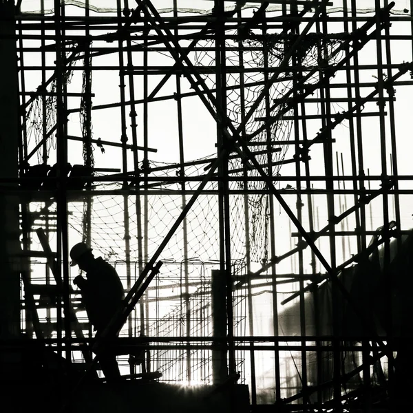 Silhouette of construction worker — Stock Photo, Image