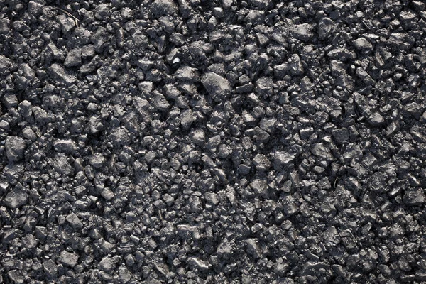 Close-up horizontal view of new asphalt road — Stock Photo, Image