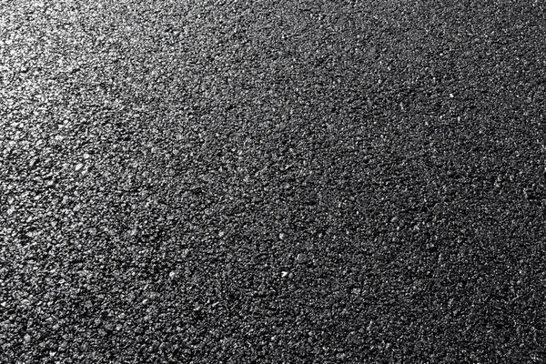 Close-up horizontal view of new asphalt road — Stock Photo, Image