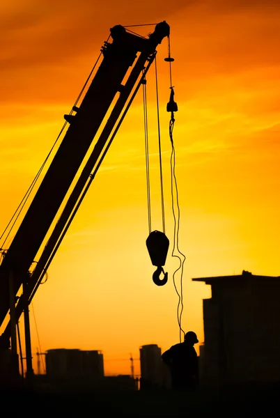 Silhouet van bouwvakker — Stockfoto