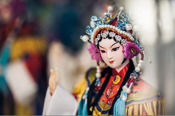 BEIJING, CHINA - DEC 16: Souvenir store's display window, December 16, 2013 in Beijing, China. Chinese classical character model is tourist souvenirs — Stock Photo, Image