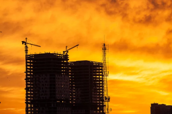 Construção canteiro de obras ao nascer do sol — Fotografia de Stock