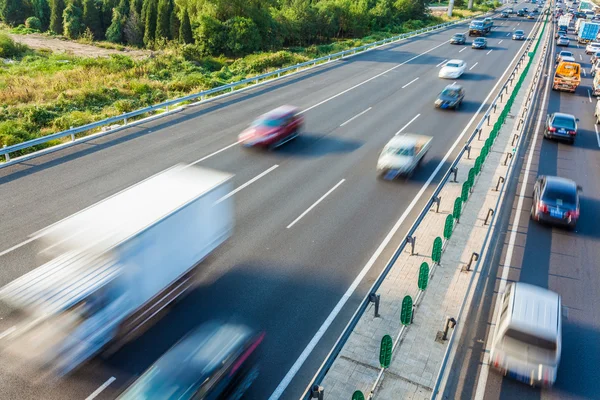 Cars in motion blur on highway,Beijing China — Stock Photo, Image