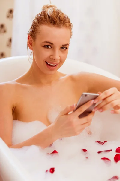 Woman taking a bath — Stock Photo, Image