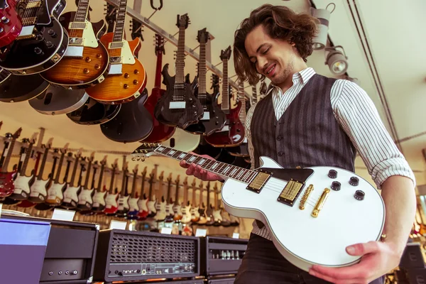 Man in musical shop