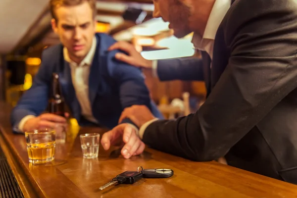 Businessmen in pub — Stock Photo, Image