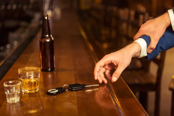 Businessmen in pub — Stock Photo, Image