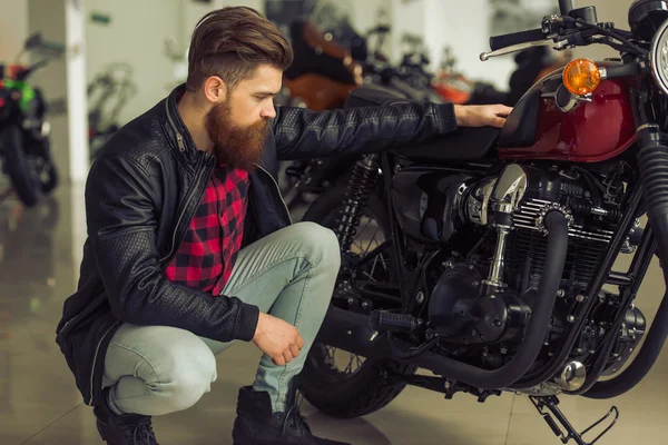 Man with motorbike — Stock Photo, Image