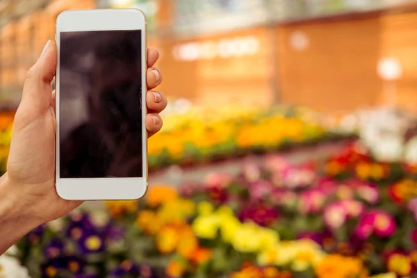 Gadget e flores — Fotografia de Stock