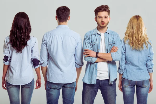 Young people in jeans — Stock Photo, Image