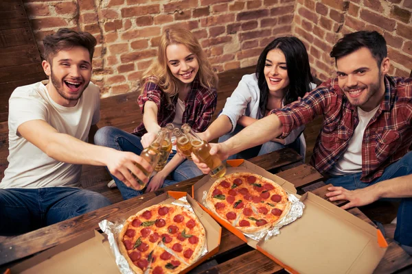 Friends enjoying pizza party Stock Photo by Rido81