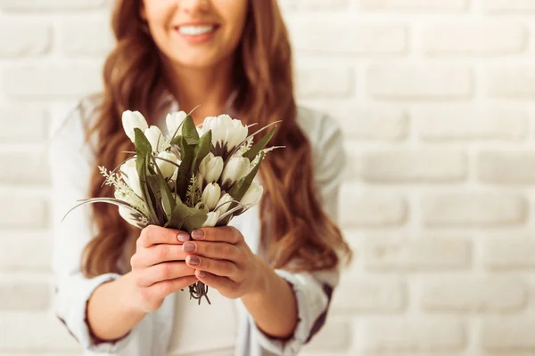 Beautiful woman with flowers — Stock Photo, Image