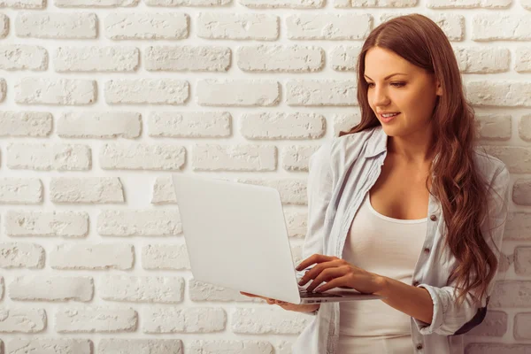 Beautiful woman with gadget — Stock Photo, Image