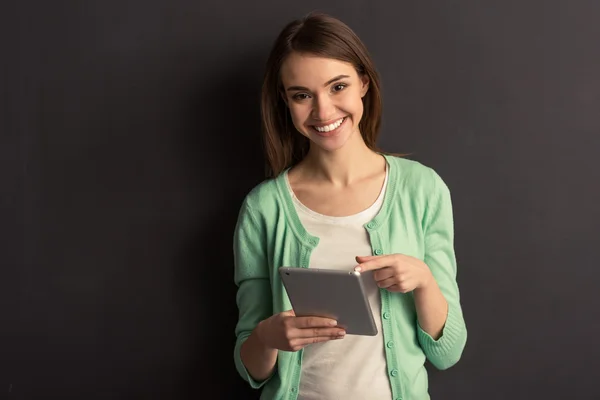 Girl with gadget — Stock Photo, Image