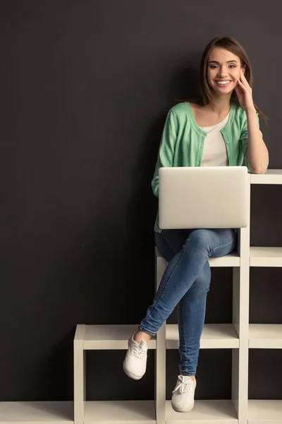 Girl with gadget — Stock Photo, Image