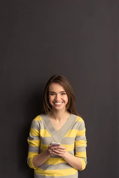 Girl with gadget Stock Image