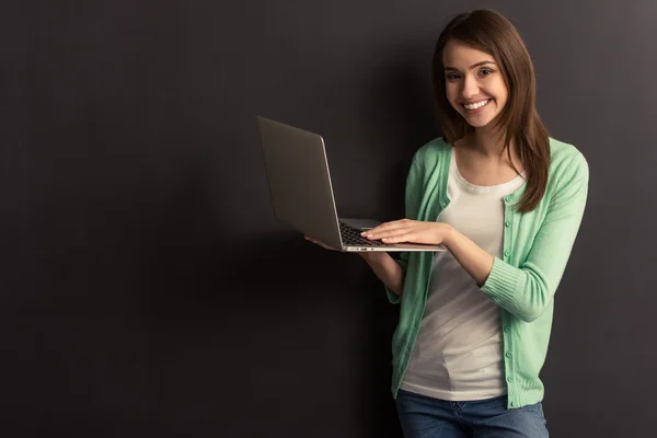 Girl with gadget — Stock Photo, Image