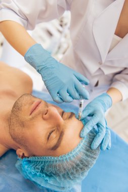 Plastik cerrah adama