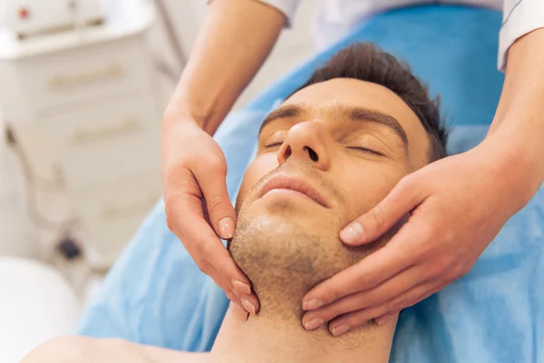 Man at the cosmetician — Stock Photo, Image