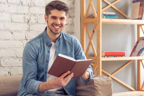 Attractive young man at home — Stock Photo, Image