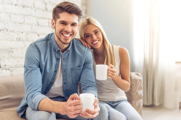 Beautiful couple at home — Stock Photo, Image