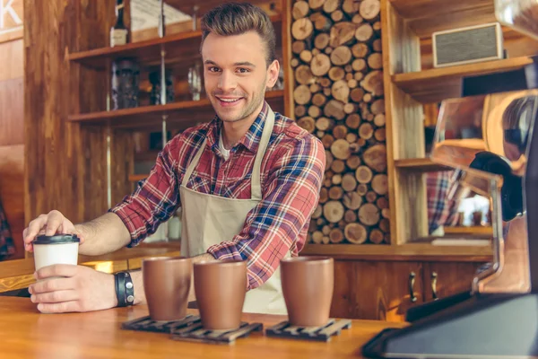 Handsome barista at cafe — Stock Photo, Image