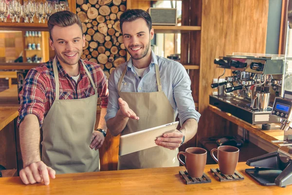 Handsome workers at cafe — Stock Photo, Image