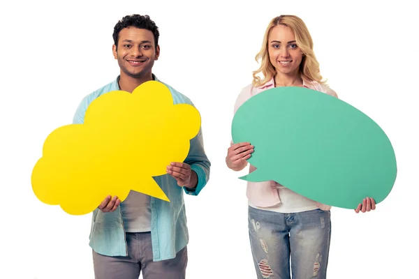 Young people with speech bubbles — Stock Photo, Image