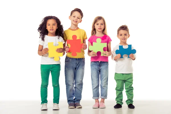 Lindos niños con rompecabezas — Foto de Stock