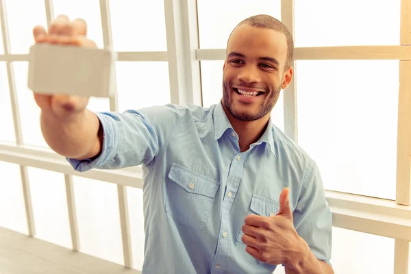 Afro American man with gadget — Stock Photo, Image