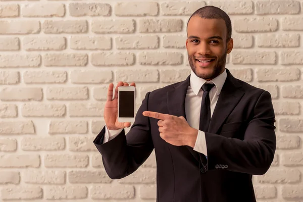 Afro hombre de negocios americano con gadget —  Fotos de Stock