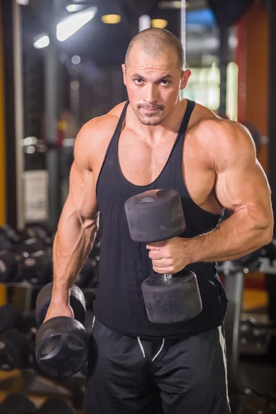 Bodybuilder at gym — Stock Photo, Image