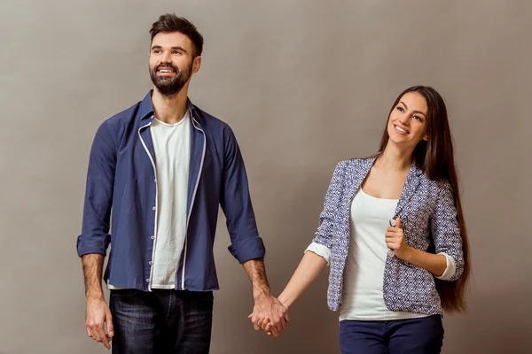 Young couple in the studio — Stock Photo, Image