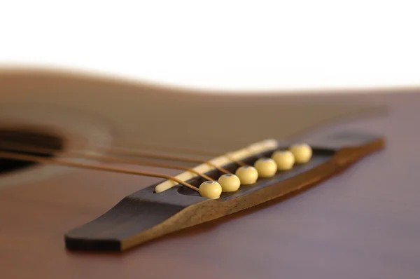 Detail of bridge of acoustic guitar — Stock Photo, Image