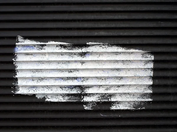 Spot of white paint on the old roller blinds. — Stock Photo, Image