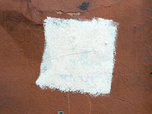 Quadrato vernice bianca su una vecchia parete in gesso Immagine Stock