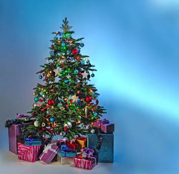 Christmas tree with gifts — Stock Photo, Image