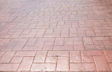 Çakıl taşlarından ve tuğlalardan yapılmış taş bir duvar, bir resim için arka plan olarak doku şeklinde.