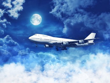 Bulutların üstündeki uçak