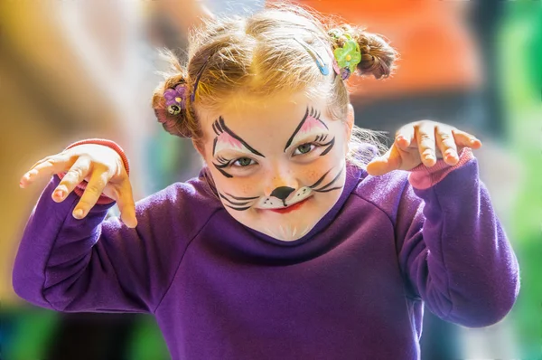 Funny little girl with painted face — Stock Photo, Image