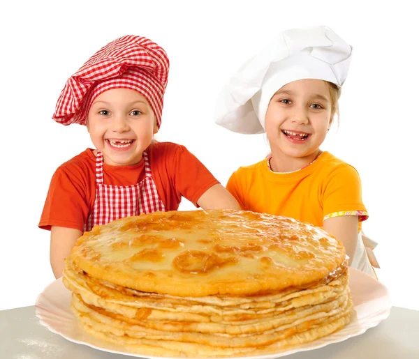 Happy kids with pancakes — Stock Photo, Image