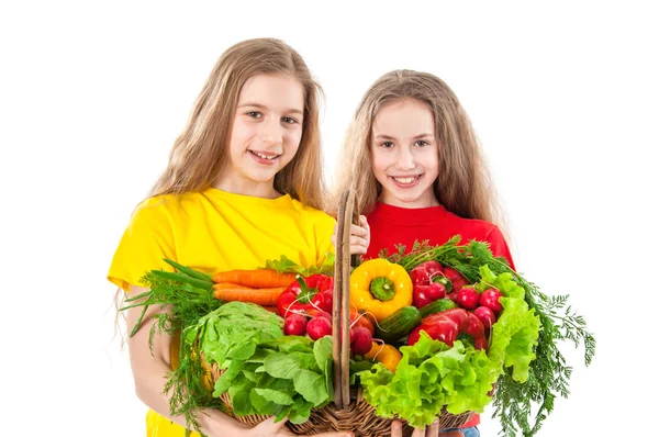 Beautiful girls with vegetables — Stock Photo, Image